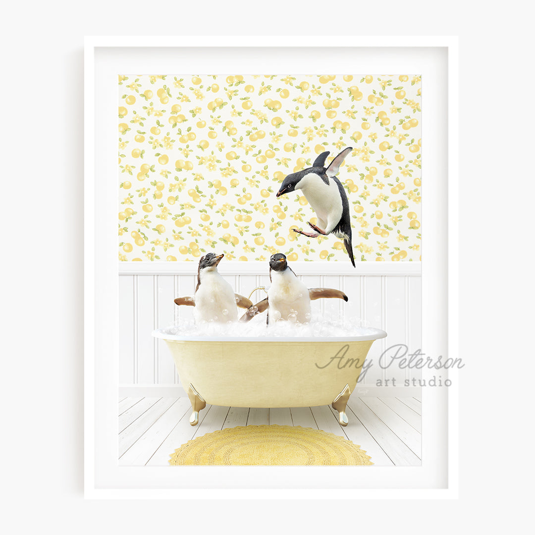 a picture of three penguins in a bathtub