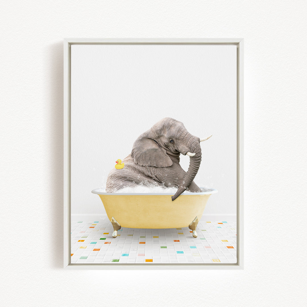 A gray elephant is sitting in a yellow bathtub, surrounded by colorful tiles on the floor.