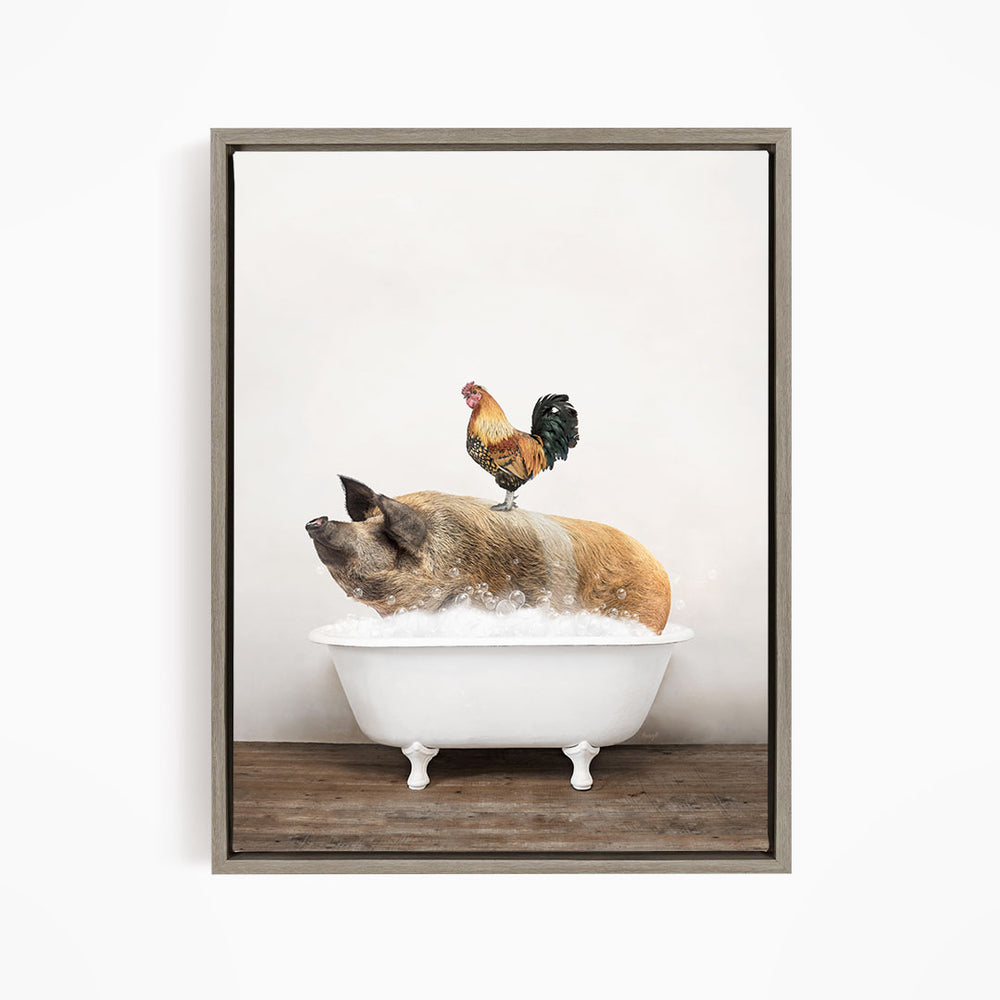A rooster sits atop a pig in a white bathtub, creating a whimsical and humorous scene.