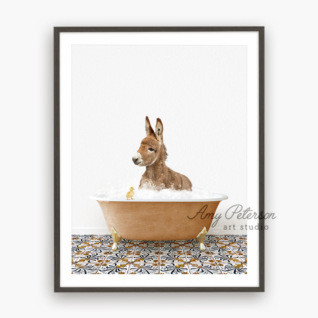 a dog sitting in a bathtub with bubbles in it