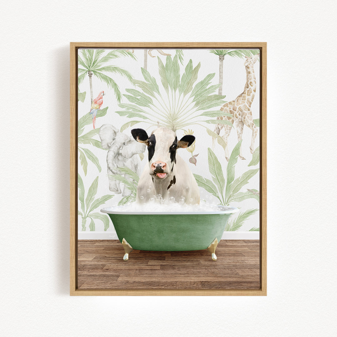 A cow is sitting in a green bathtub filled with bubbles, surrounded by tropical foliage and a giraffe in the background.
