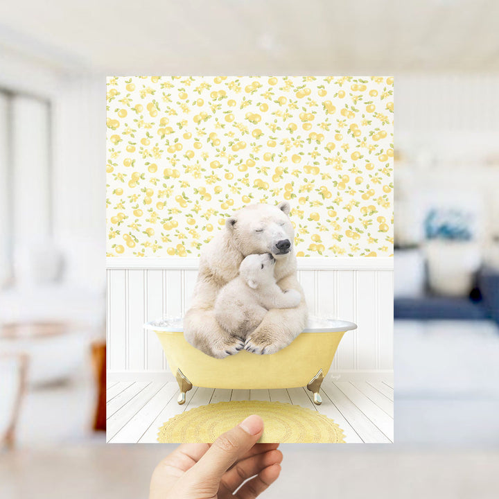 A polar bear is sitting in a yellow bathtub, with a baby polar bear nestled next to it, against a yellow and white floral wallpaper.