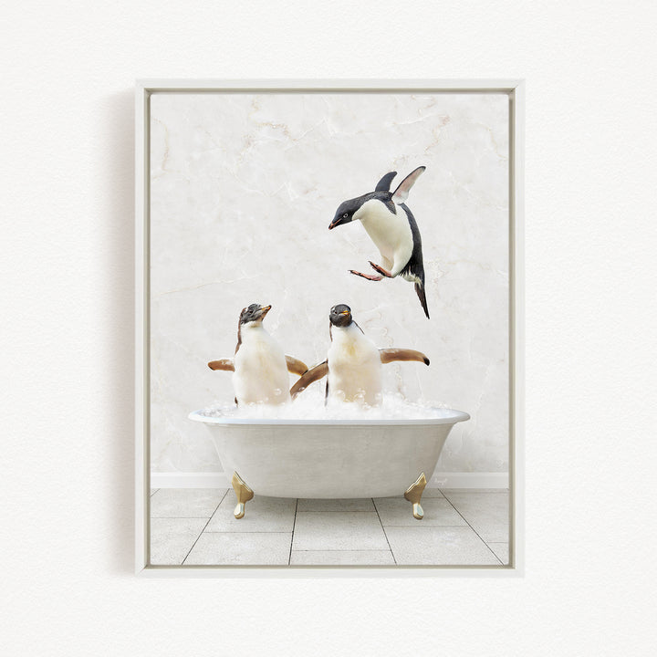 A framed image depicting two penguins sitting in a bathtub, with one penguin flying towards the other penguin.