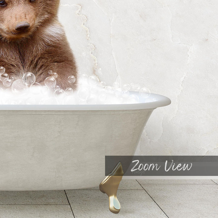 A brown bear sitting in a white bathtub filled with bubbles, with the text "Zoom View" displayed below the image.