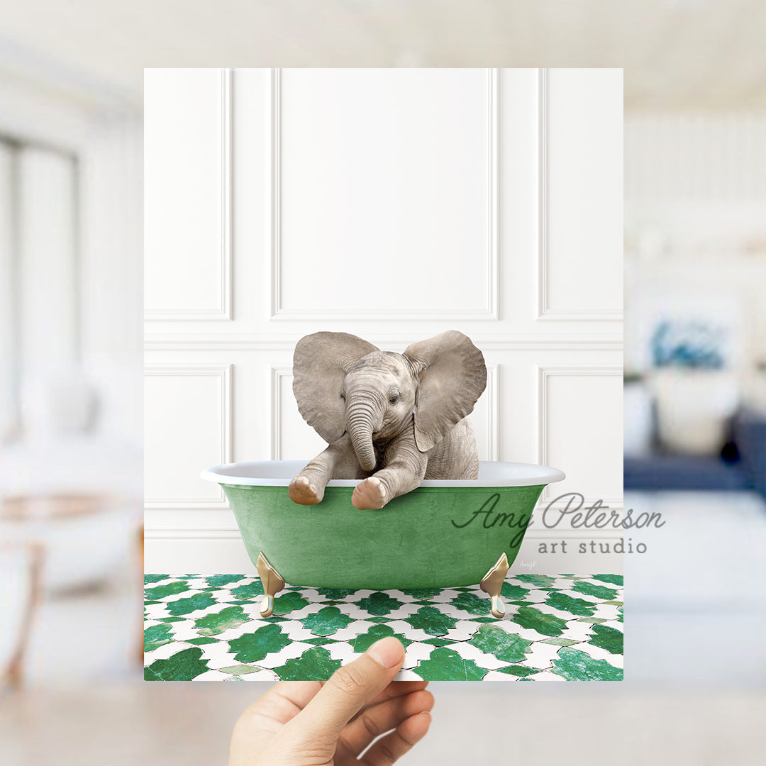 a person holding up a card with an elephant in a bathtub