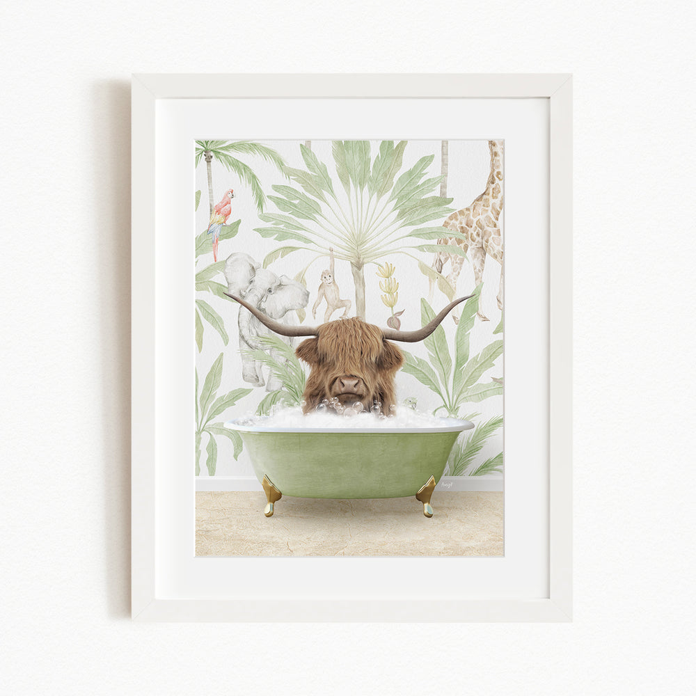 A framed illustration depicting a cow with long horns sitting in a green bathtub, surrounded by tropical foliage and animals.
