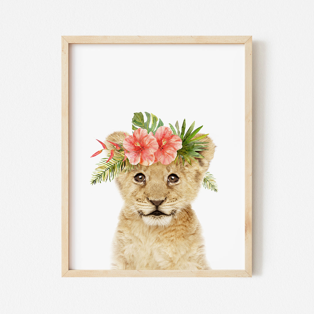 a picture of a lion cub wearing a flower crown