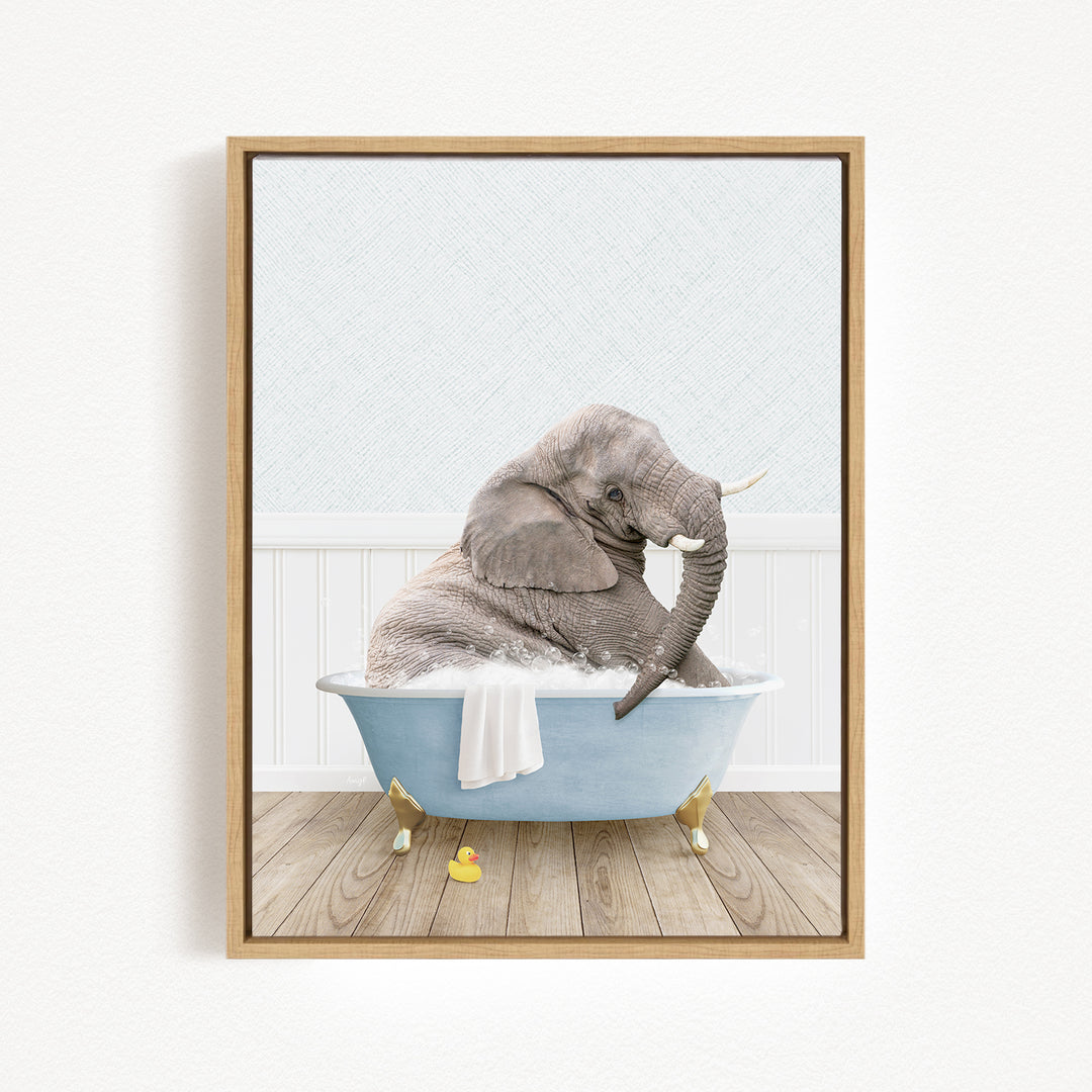 A gray elephant is sitting in a blue bathtub filled with water, surrounded by a white wall and wooden floor.