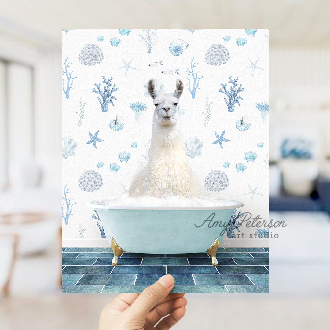 a person holding up a card with a llama in a bathtub