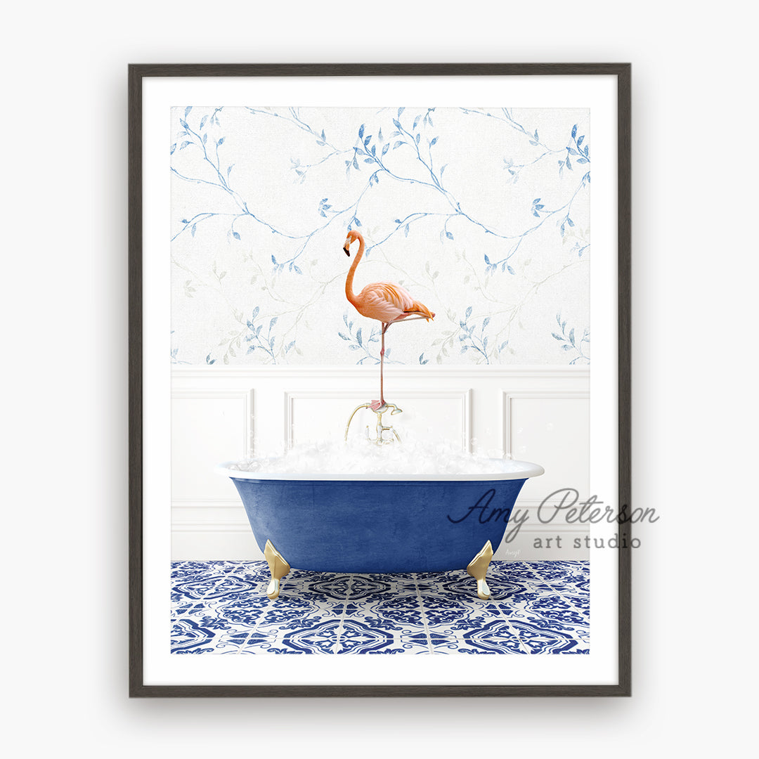 a pink flamingo standing on top of a blue bathtub