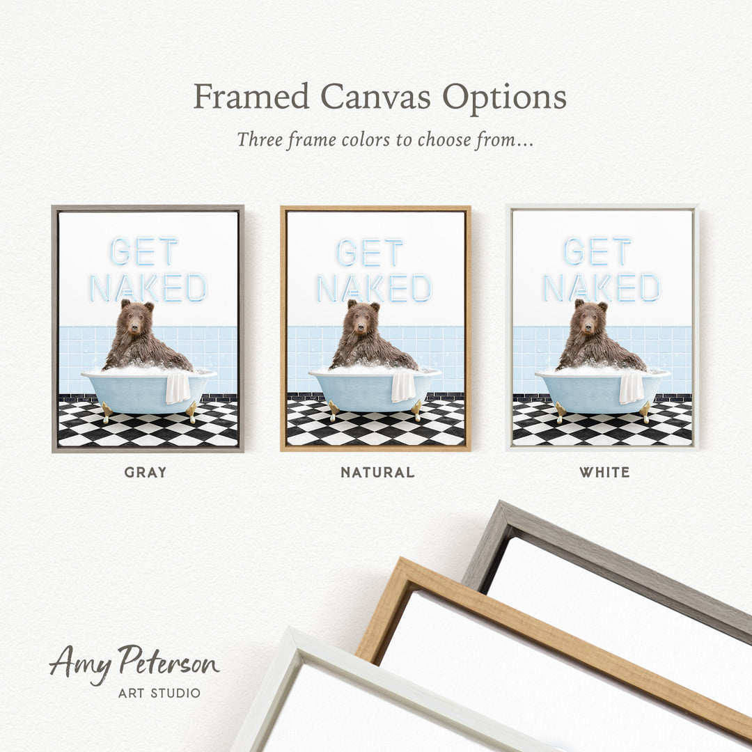 three framed canvas options featuring a brown bear sitting in a bathtub. The options include a gray frame, a natural frame, and a white frame.