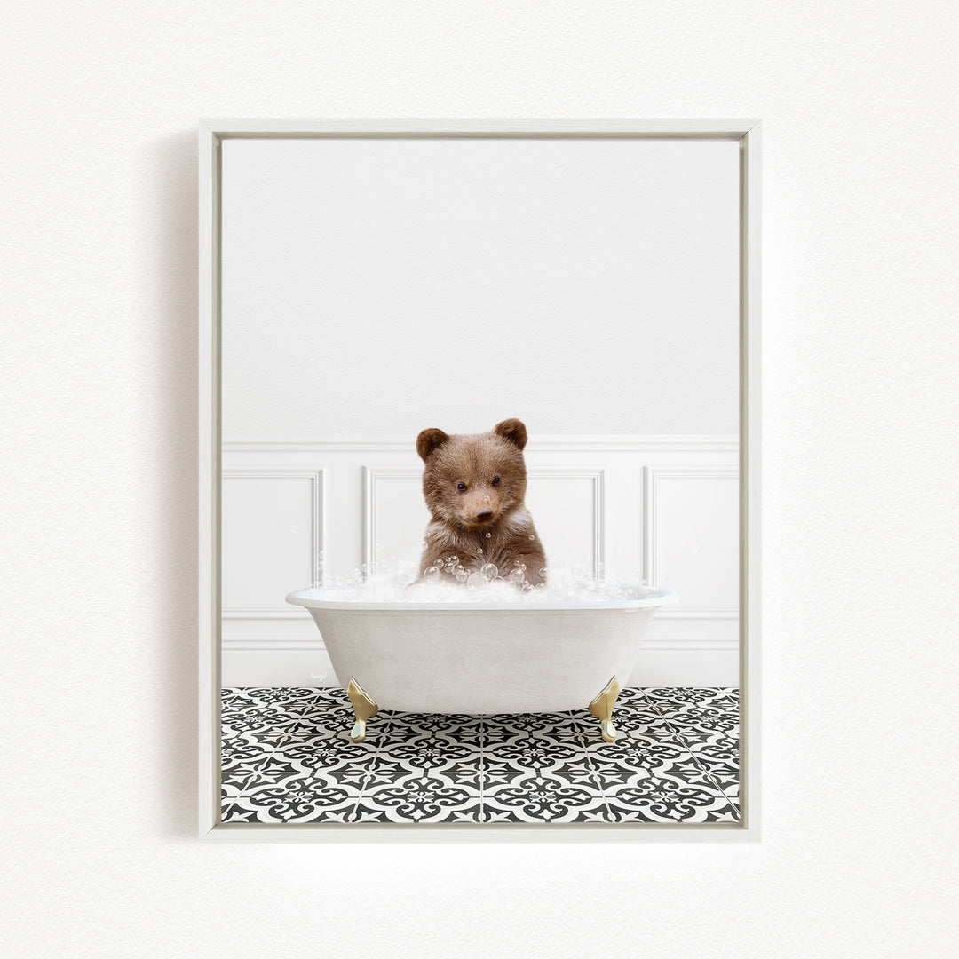 A brown bear sitting in a white bathtub filled with water, surrounded by a black and white patterned floor.