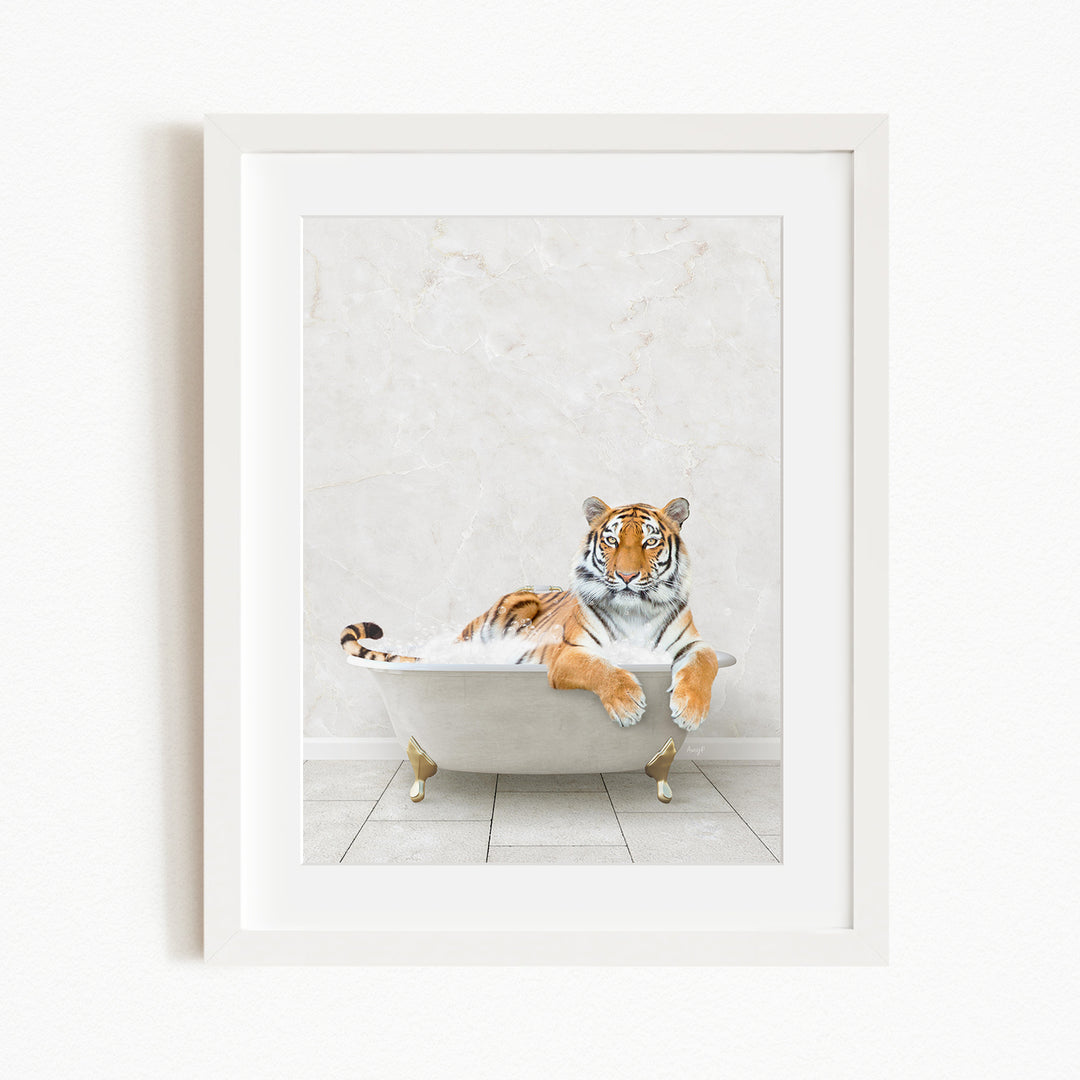 A tiger is sitting in a white bathtub, appearing relaxed and enjoying the bath.