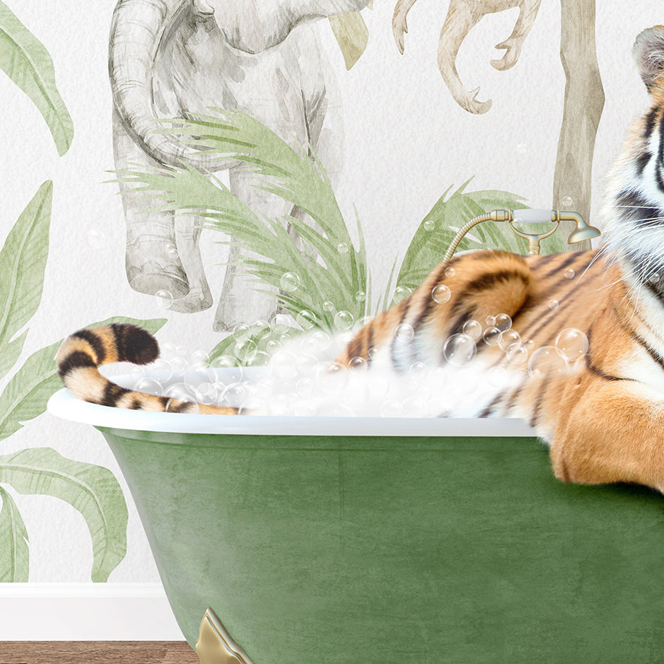 a stuffed tiger is sitting in a bathtub