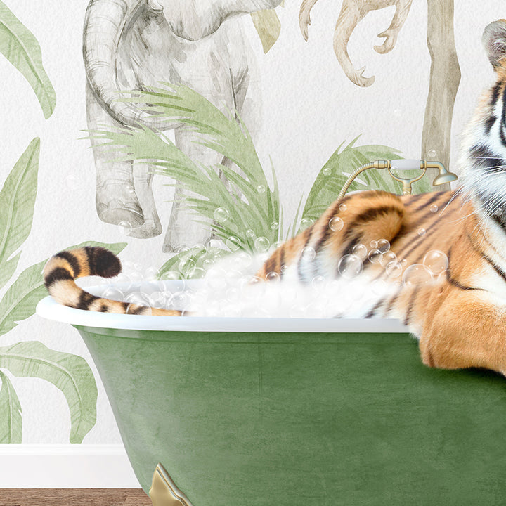 a stuffed tiger is sitting in a bathtub