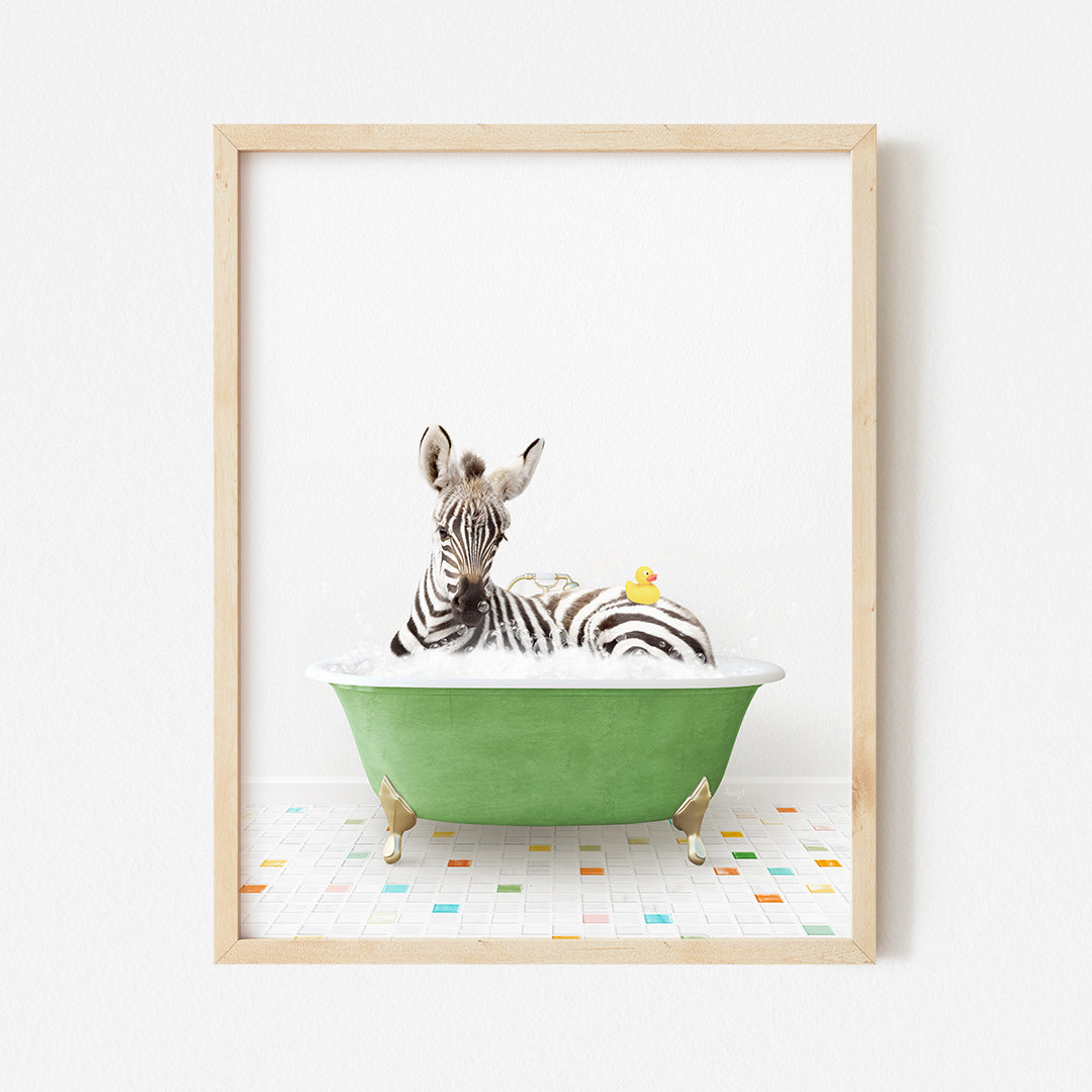 a zebra laying down in a green bath tub