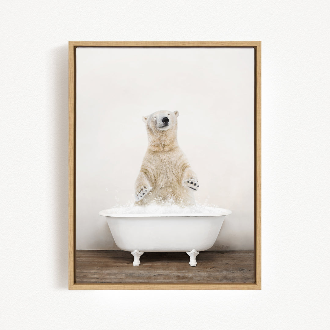 A polar bear standing in a white bathtub filled with water, with its paws raised in the air.