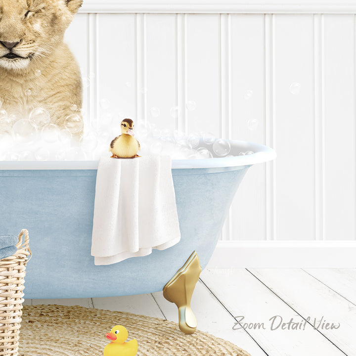 A light blue bathtub filled with bubbles, with a small yellow rubber duck sitting on the edge and a small brown bird figurine perched on the edge of the tub.