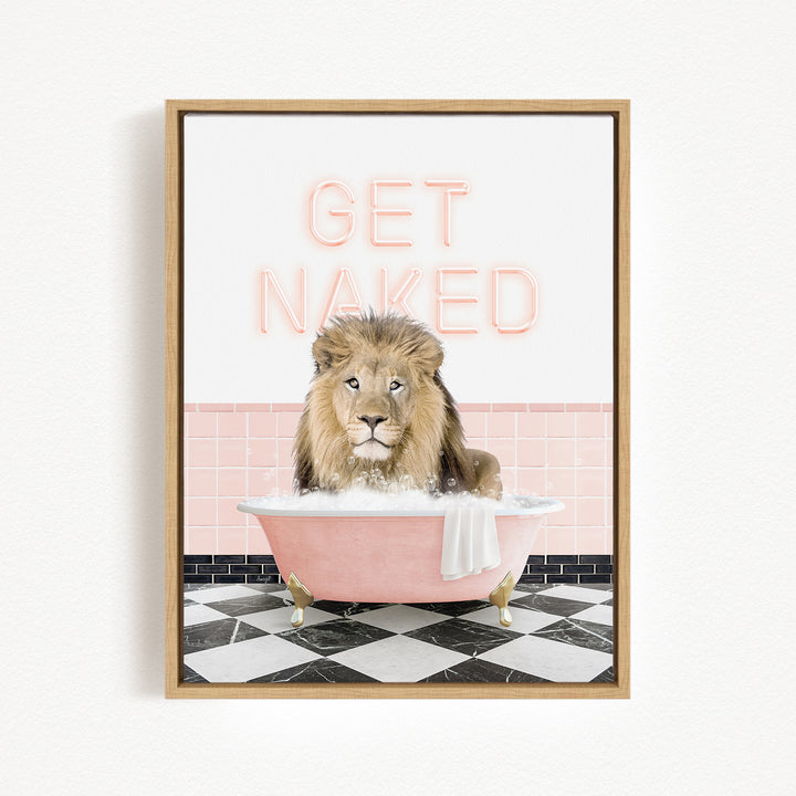 A lion sitting in a pink bathtub with the text "GET NAKED" displayed above it.