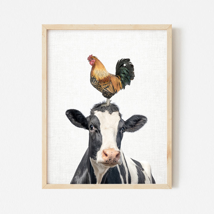 a picture of a chicken on top of a cow