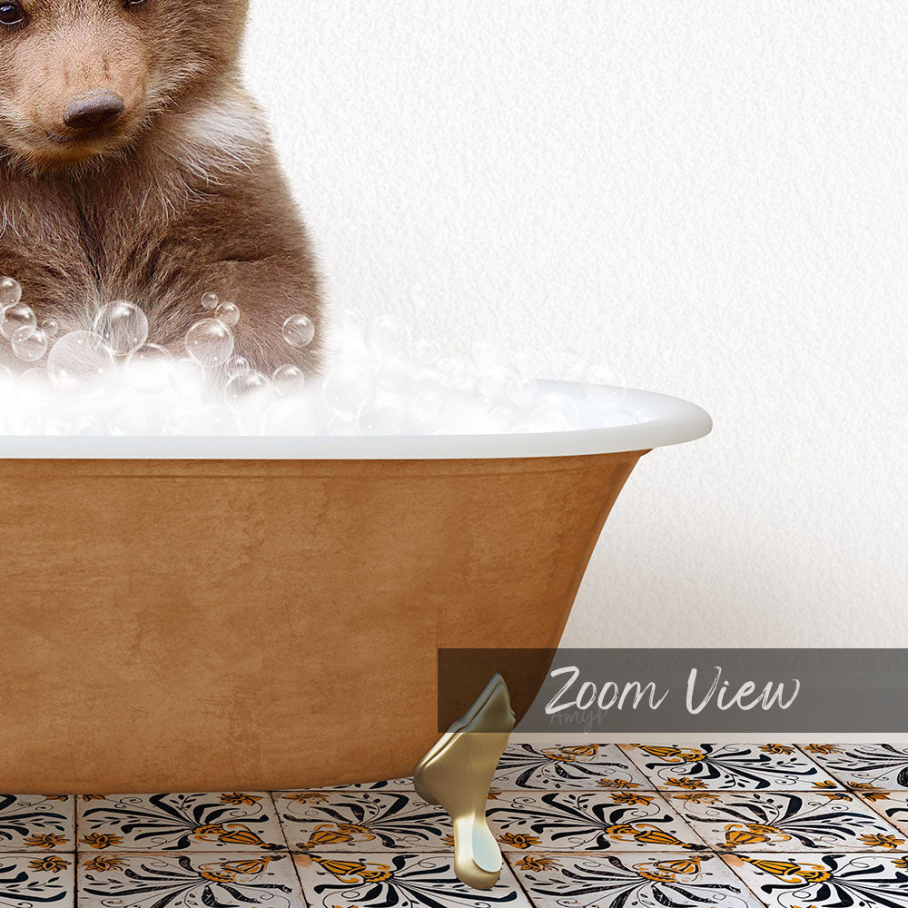 A brown bear is sitting in a bathtub filled with bubbles, with a decorative tile floor visible beneath the tub.