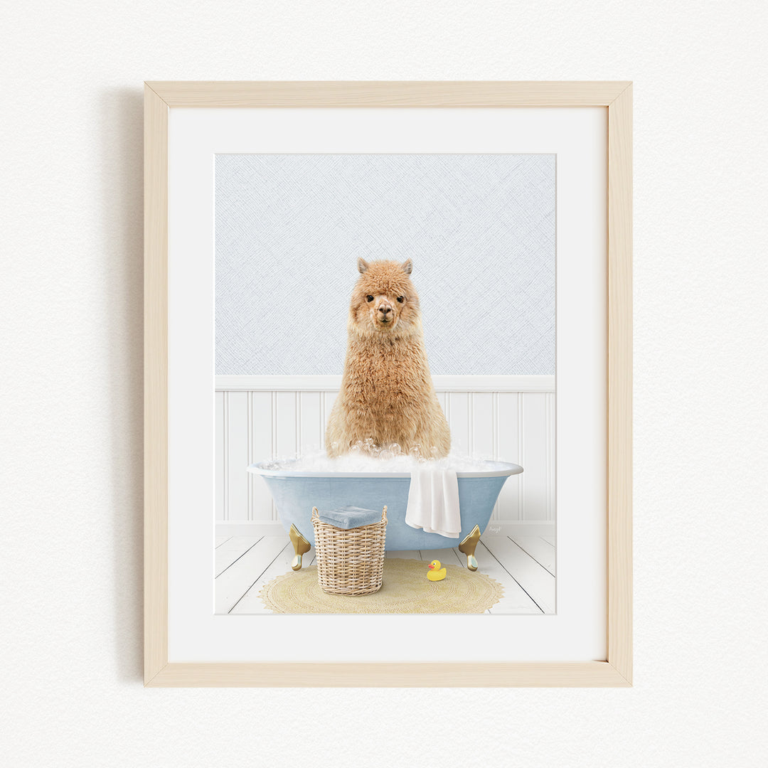 A fluffy brown dog sitting in a blue bathtub filled with bubbles, surrounded by rubber ducks and a yellow towel.