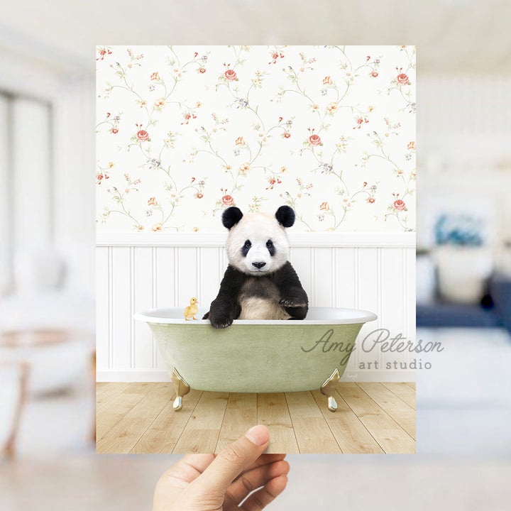 a panda bear sitting in a bath tub