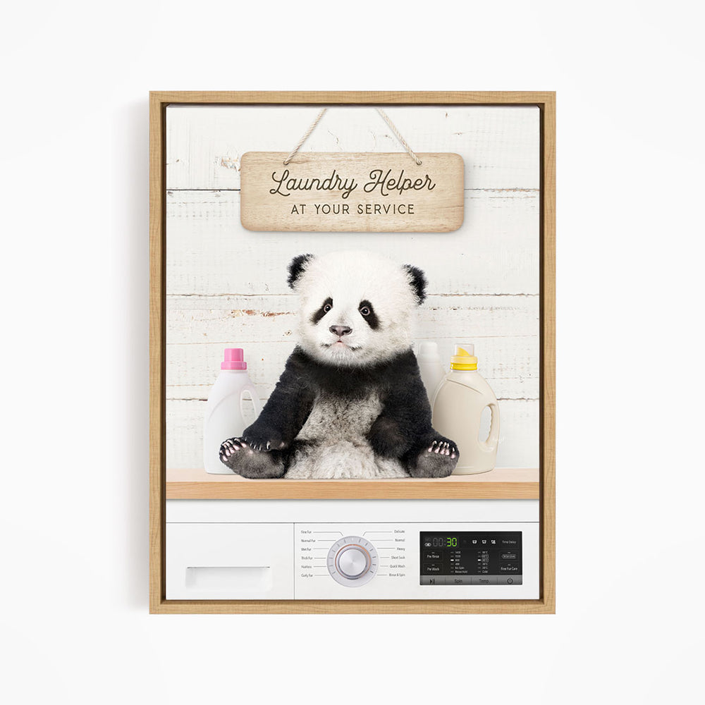 A panda bear sitting on a shelf next to a sign that says "Laundry Helper at your service".
