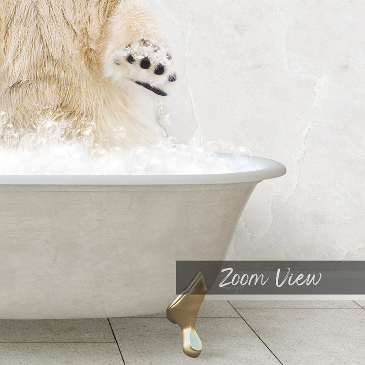 A white bathtub filled with bubbles, with a paw resting on the edge of the tub.