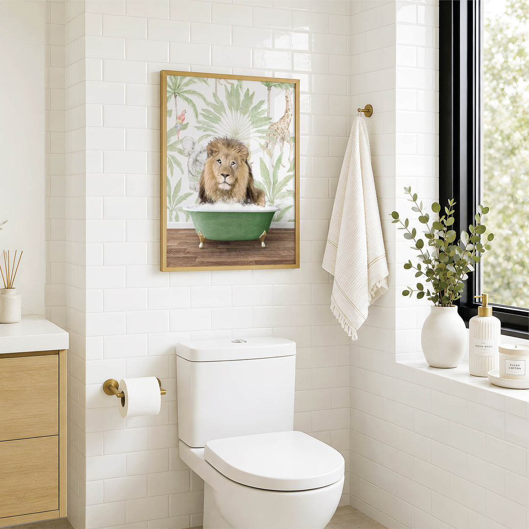 A bathroom with a white toilet, a framed picture of a lion in a bathtub, and a window with greenery on the sill.