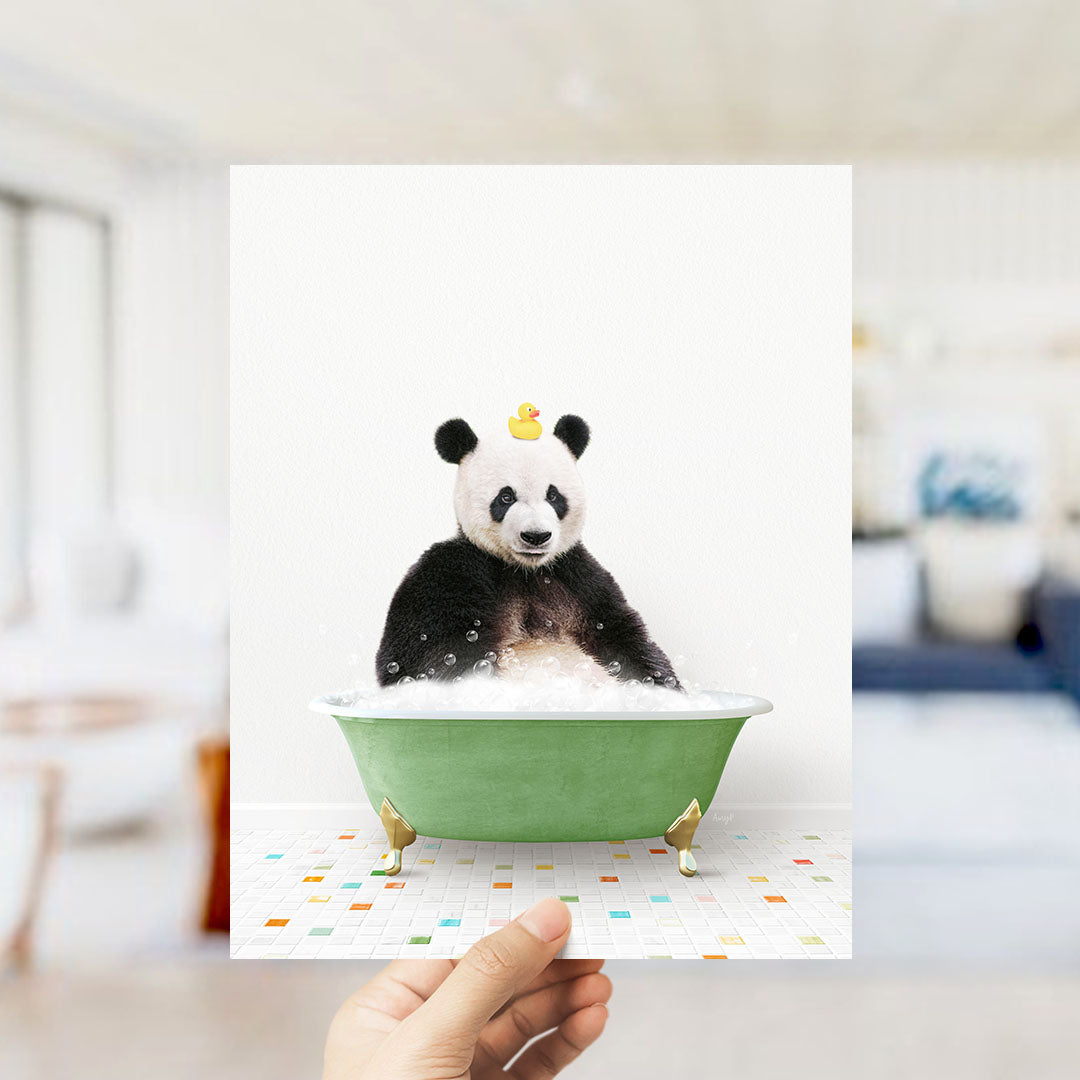 A panda bear sitting in a green bathtub filled with bubbles, with a rubber duck on its head.