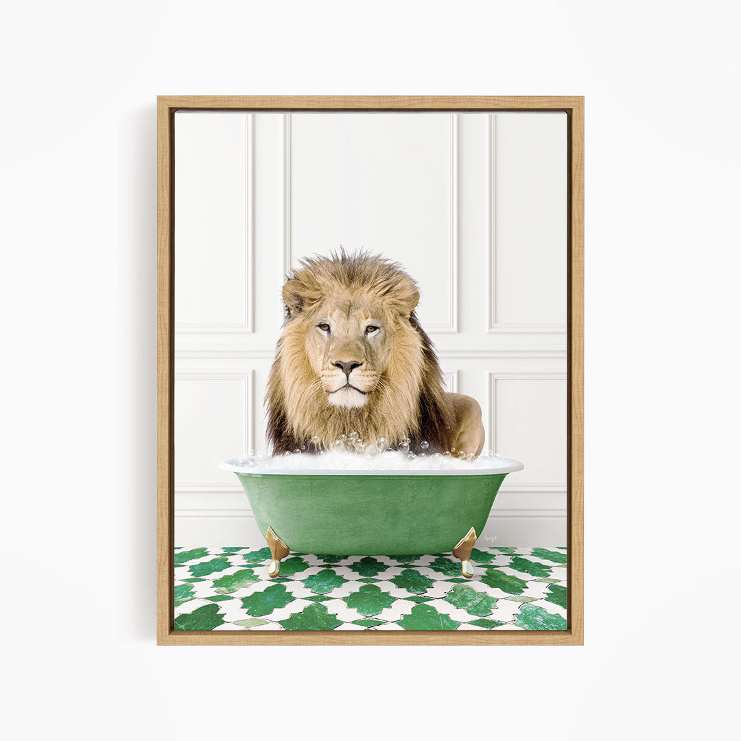 A lion sitting in a green bathtub filled with bubbles, looking directly at the camera.