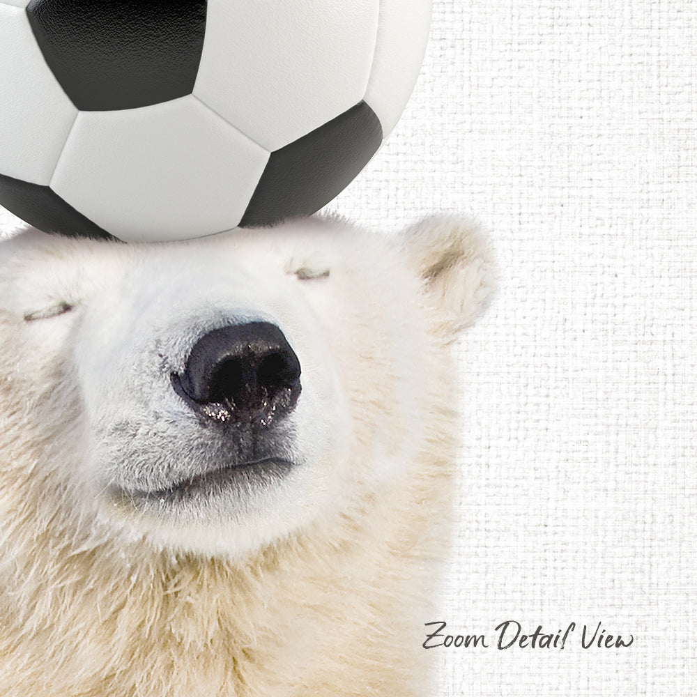 A polar bear with its eyes closed, resting its head on a soccer ball.