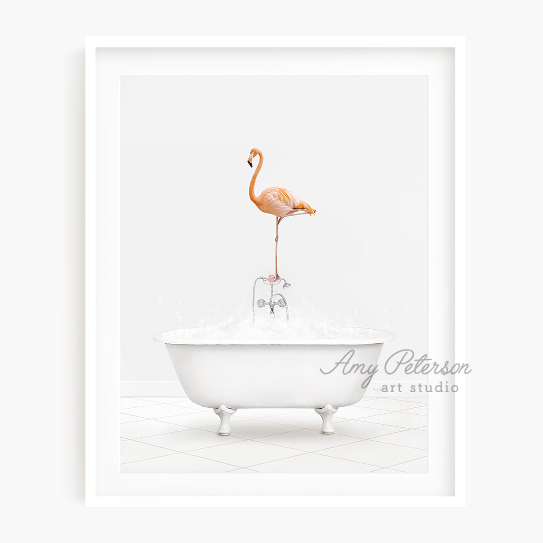 a pink flamingo standing on a bathtub in a bathroom