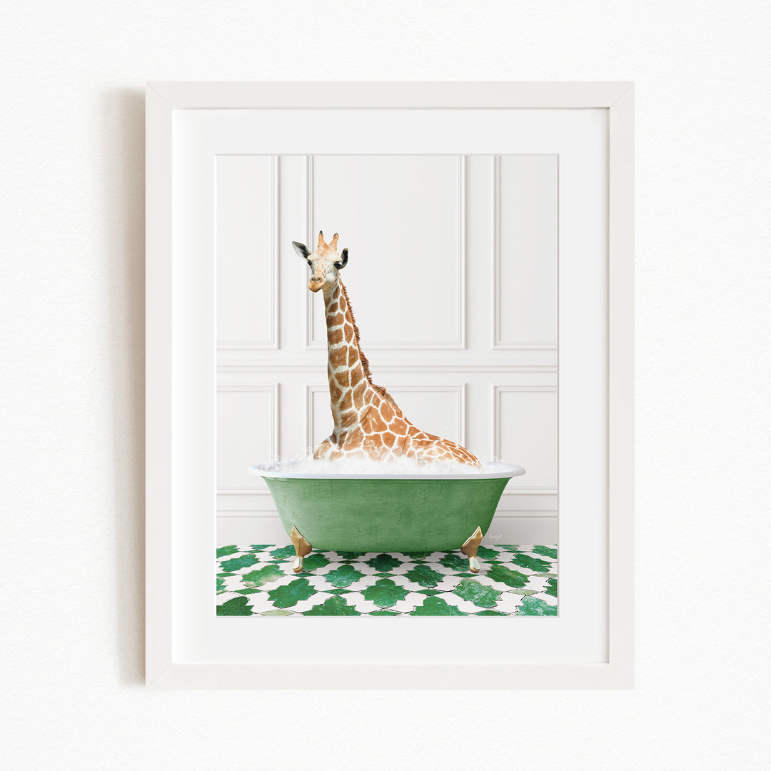 A giraffe sitting in a green bathtub filled with bubbles, surrounded by a green and white patterned rug.