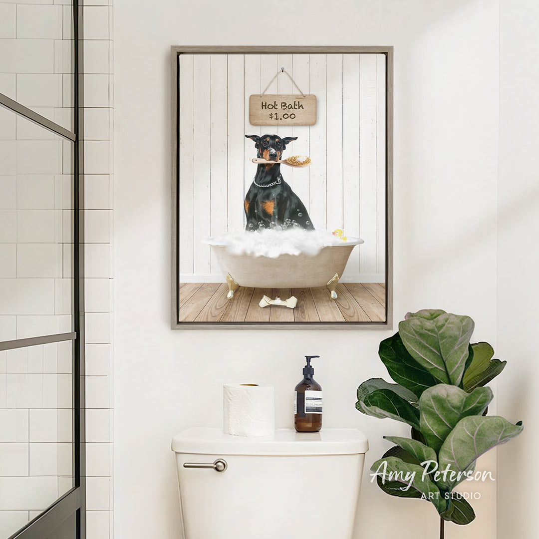 A framed image of a dog sitting in a bathtub, with a sign above it that says "Hot Bath is $5.00".
