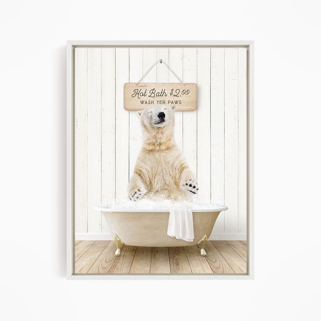 A polar bear sitting in a bathtub, with a sign above it that says "Hot Bath $2.00 WASH YER PAWS".