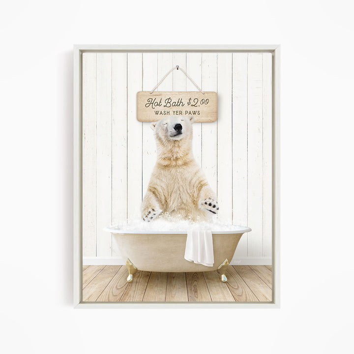 A polar bear sitting in a bathtub, with a sign above it that says "Hot Bath $2.00 WASH YER PAWS".