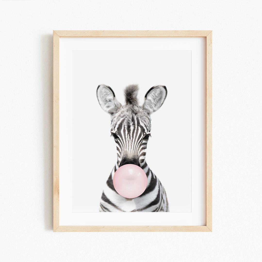 a picture of a zebra with a bubble in its mouth