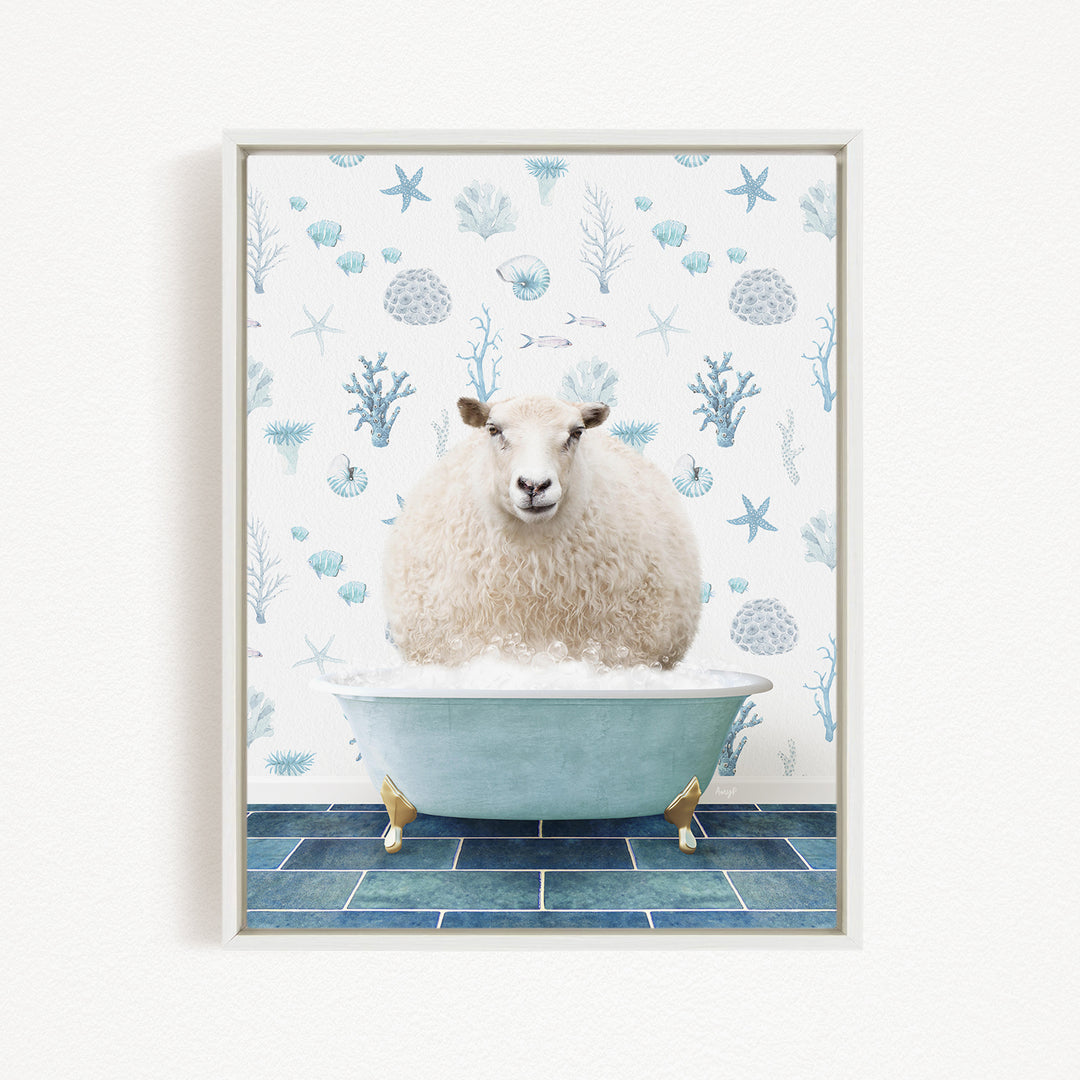 A fluffy white sheep is sitting in a blue bathtub filled with bubbles, surrounded by a pattern of blue and white seashells and starfish on the wall behind it.