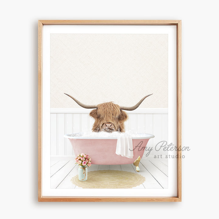 a picture of a cow with long horns in a bathtub