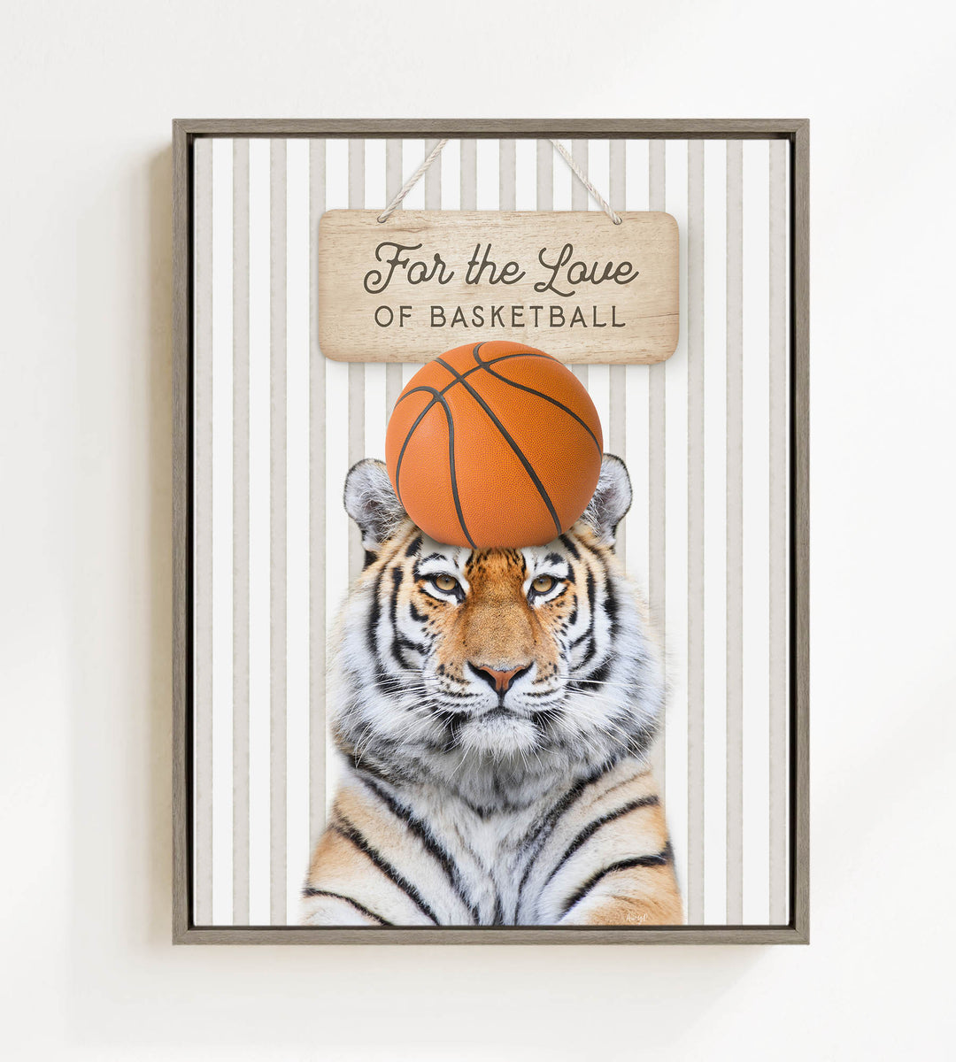 A tiger is standing on a basketball, with a sign above it that says "For the Love of Basketball".