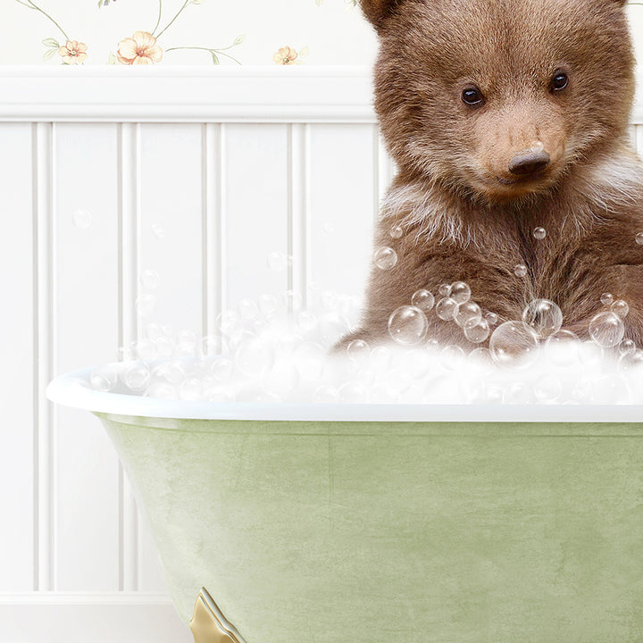 a brown bear sitting in a bath tub filled with bubbles