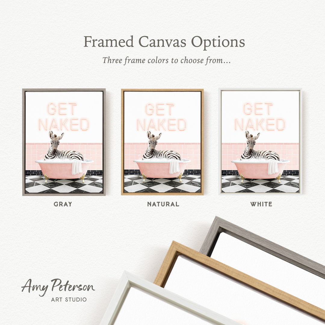 three framed canvas options, each featuring a zebra sitting in a bathtub. The options include a gray frame, a natural frame, and a white frame. The text above the options reads " framed Canvas Options" and "Three frame colors to choose from...".