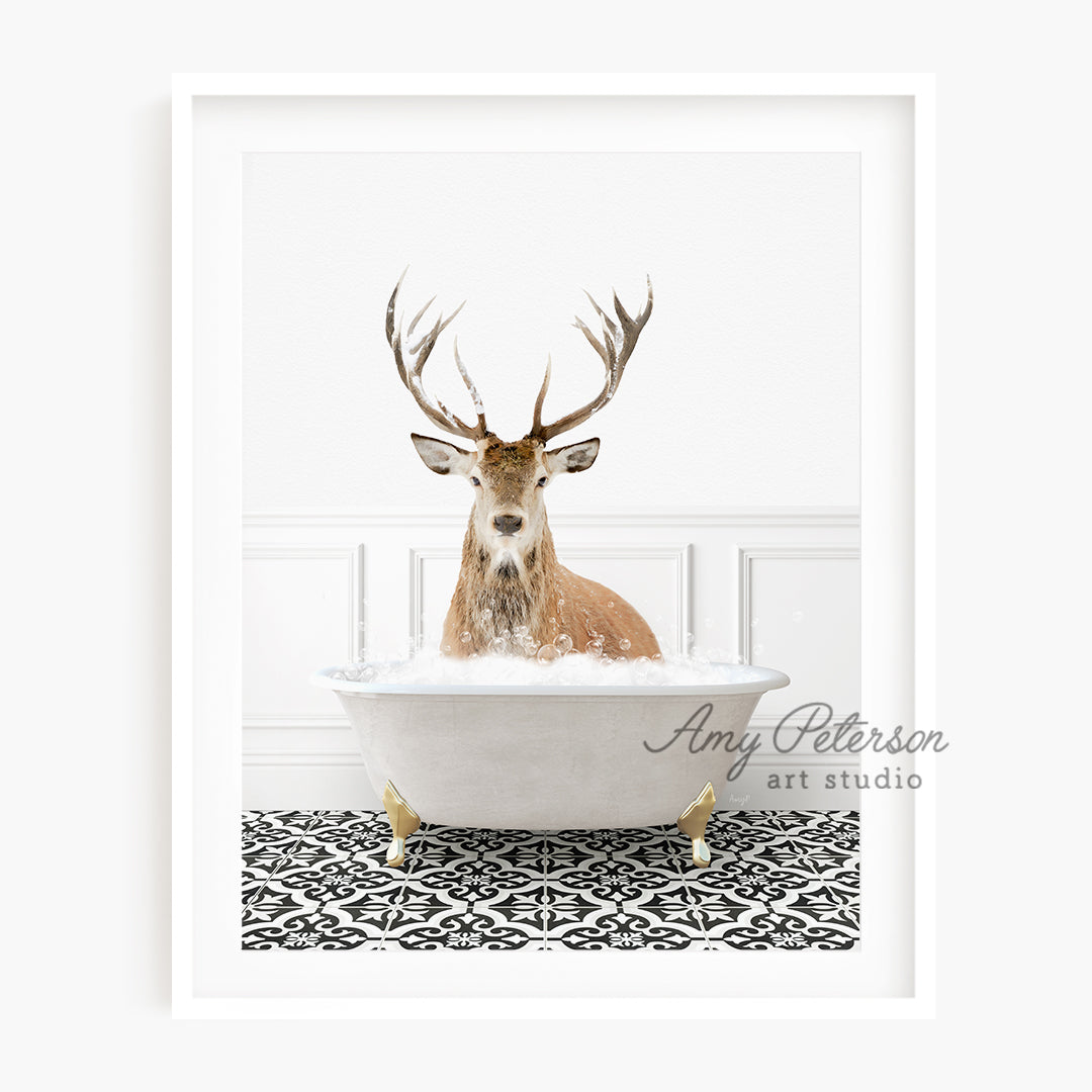 a picture of a deer sitting in a bathtub