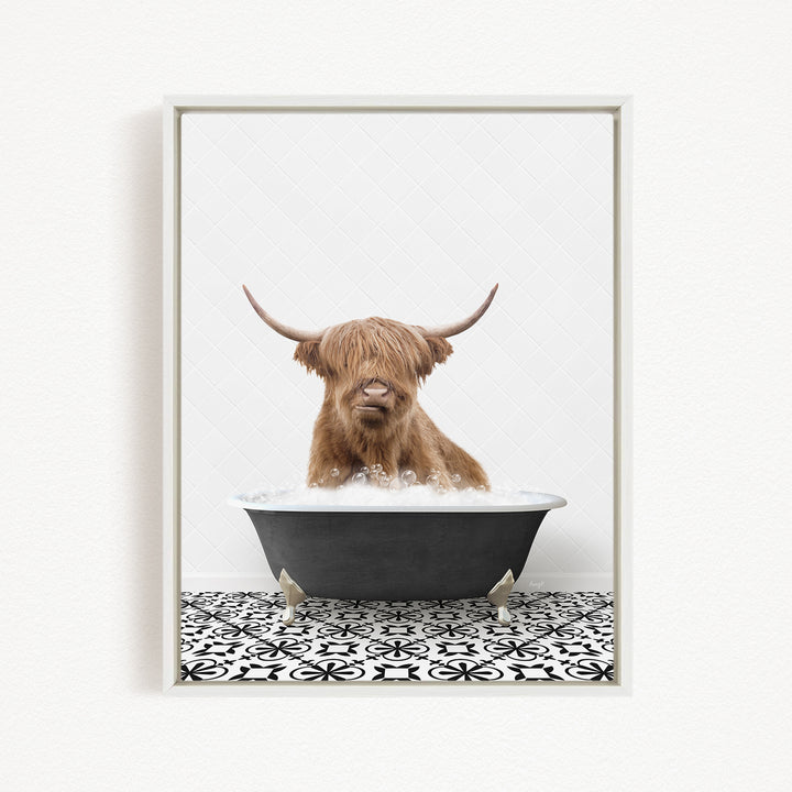A Highland cow with shaggy brown hair is sitting in a black bathtub filled with water, creating a whimsical and playful scene.