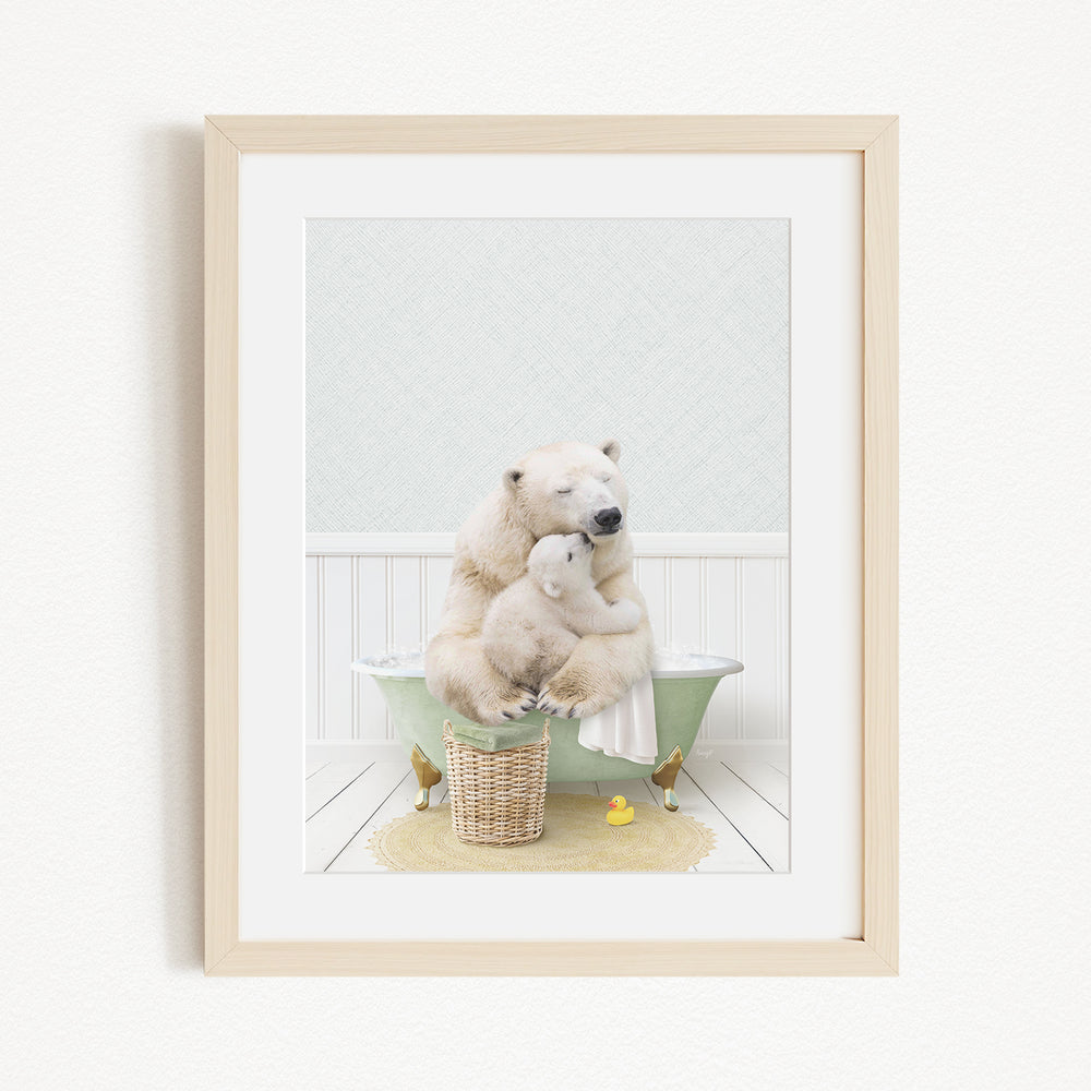A framed image depicting a polar bear sitting in a bathtub, with a baby polar bear nestled next to it.
