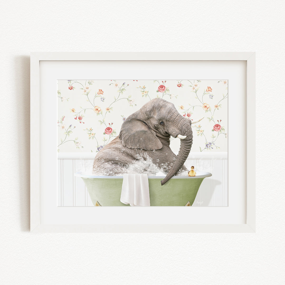 A gray elephant is sitting in a green bathtub filled with water, surrounded by a floral patterned wall.
