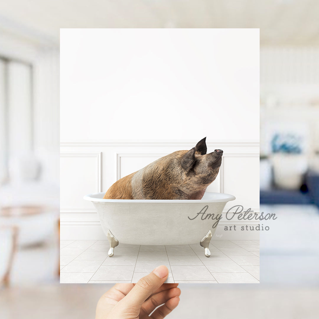 a hand holding a card with a dog in a bathtub