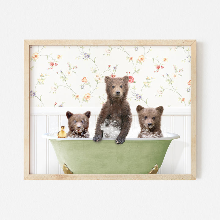 a group of bears sitting in a bath tub